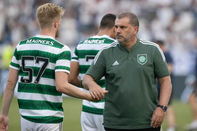 OSTRAVA, CZECH REPUBLIC - JULY 13: Celtic's Ange Postecoglou shakes hands with Stephen Welsh at full time during a pre-season friendly match between Banik Ostrava and Celtic at the Mestsky Stadion, on July 13, 2022, in Ostrava, Czech Republic.