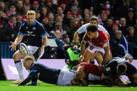 An inspired Finn Russell offloads to Kyle Steyn for the Scotland winger to score his second try of the match.