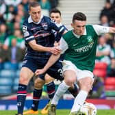 Jackson Irvine, playing for Ross County, battles with former Hibs midfielder John McGinn during the Highand side's victory over the Leith club in the 2016 League Cup final. Photo by Craig Foy/SNS Group