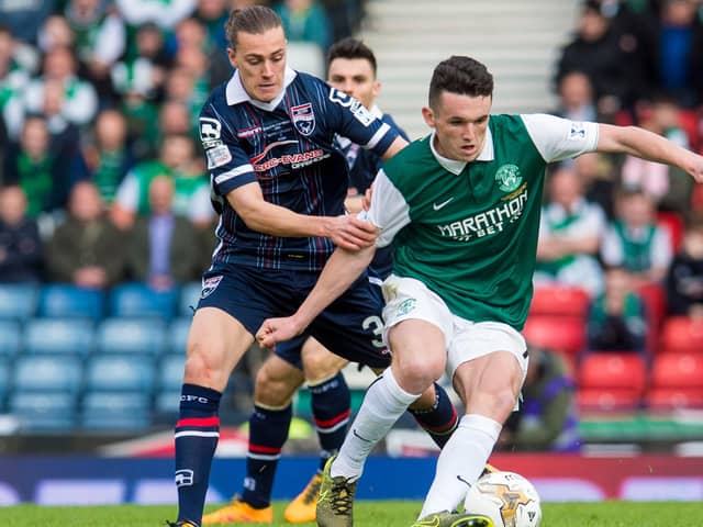 Jackson Irvine, playing for Ross County, battles with former Hibs midfielder John McGinn during the Highand side's victory over the Leith club in the 2016 League Cup final. Photo by Craig Foy/SNS Group