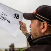 A commemorative pin flag, featuring Old Tom's name, iconic cross clubs and bicentenary dates will proudly fly on the 18th green of the Old Course on Wednesday. Picture: St Andrews Links Trust