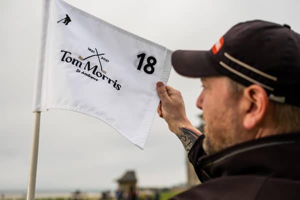 A commemorative pin flag, featuring Old Tom's name, iconic cross clubs and bicentenary dates will proudly fly on the 18th green of the Old Course on Wednesday. Picture: St Andrews Links Trust