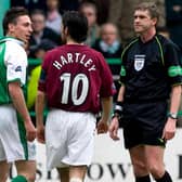 Scott Brown and Paul Hartley clashed while Hibs and Hearts players but would go on to become team-mates. Picture: SNS