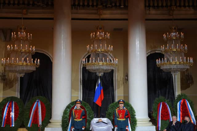 Honour guards stand next to the coffin of Mikhail Gorbachev during yesterday's memorial service in the House of Unions in Moscow