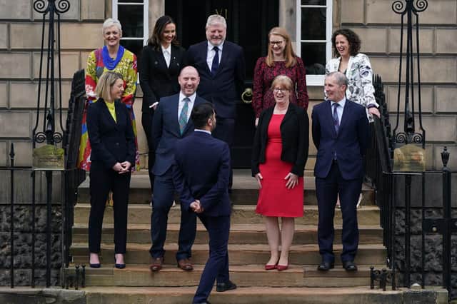Michael Matheson, Secretary for NHS Recovery, Health and Social Care, front right, with the Cabinet on the steps of Bute House
