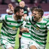 Anthony Ralston of Celtic celebrates with teammate James Forrest after scoring his team's first goal during the Ladbrokes Scottish Premiership match between Heart of Midlothian and Celtic at Tynecastle Park on July 31, 2021. Picture: Steve Welsh/Getty Images