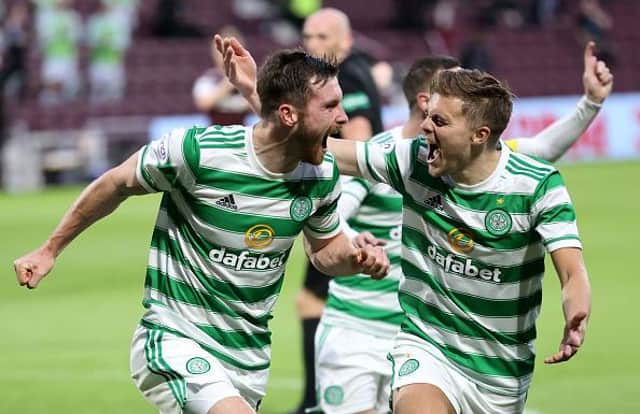 Anthony Ralston of Celtic celebrates with teammate James Forrest after scoring his team's first goal during the Ladbrokes Scottish Premiership match between Heart of Midlothian and Celtic at Tynecastle Park on July 31, 2021. Picture: Steve Welsh/Getty Images