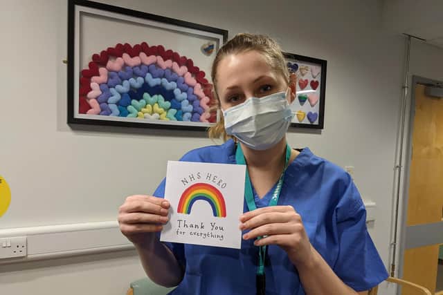 Auxiliary Margaret Cooper with one of Paddy's thank-you cards.