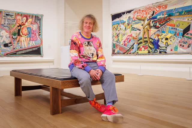 Grayson Perry with his exhibition at the Royal Scottish Academy PIC: Nick Mailer