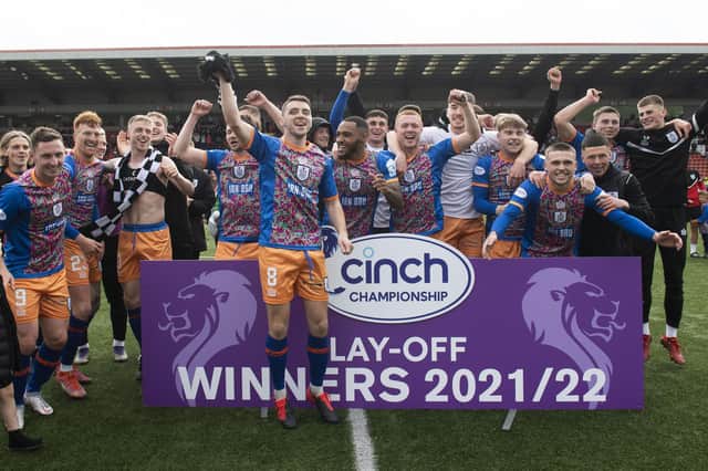 Queen's Park players celebrate promotion to the Championship after the play-off win over Airdrie.  (Photo by Craig Foy / SNS Group)
