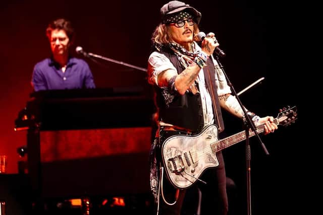 Johnny Depp (right) at the Royal Albert Hall, London, appearing alongside Jeff Beck. Picture date: Tuesday May 31, 2022. Courtesy of Raph Pour-Hashemi