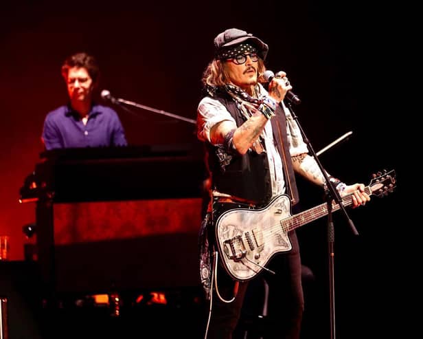Johnny Depp (right) at the Royal Albert Hall, London, appearing alongside Jeff Beck. Picture date: Tuesday May 31, 2022. Courtesy of Raph Pour-Hashemi