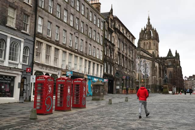 The Royal Mile in Edinburgh, the morning after stricter lockdown measures came into force for mainland Scotland in January. Picture: PA