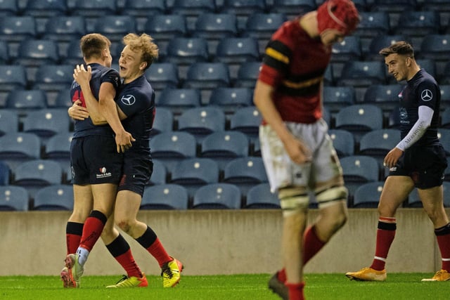 Merchiston celebrate a try in the under-18 cup final