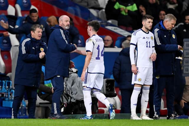 Billy Gilmour is greeted by manager Steve Clarke after being substituted on the night he scored his first-ever goal. Unfortunately it could not prevent Scotland losing 4-1 to France (Photo by Mike Hewitt/Getty Images)