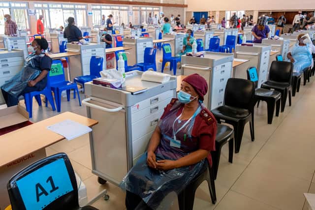 Health workers wait to administer a Covid vaccine at the Chris Hani Baragwanath Hospital in Soweto (Picture: Emmanuel Croset/AFP via Getty Images)