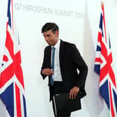 Prime Minister Rishi Sunak leaves after a press conference at the International Conference Centre during the G7 Summit