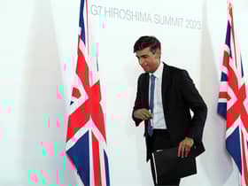 Prime Minister Rishi Sunak leaves after a press conference at the International Conference Centre during the G7 Summit