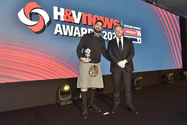 EBC's Operations Manager Ben Caird was presented with the award by Rob Beckett.