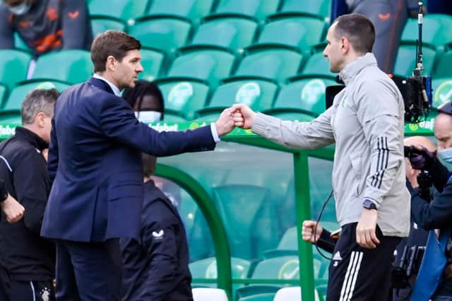 Rangers boss Steven Gerrard and Celtic counterpart John Kennedy. Picture: SNS
