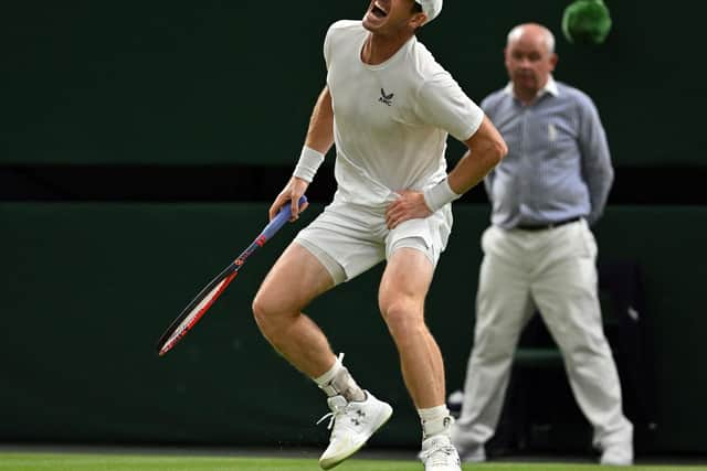 Andy Murray screams in pain during his match against Stefanos Tsitsipas but recovered to take a 2 sets to 1 lead. (Photo by GLYN KIRK/AFP via Getty Images)