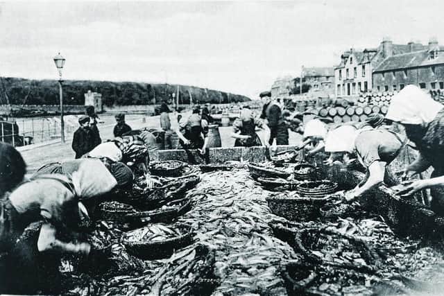 Herring gutters at Stornoway Harbour. PIC:  Stornoway Historical Society Collection