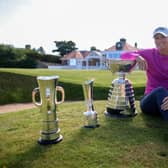 Anna Nordqvist poses outside the Muirfield clubhouse with the AIG Women’s Open trophy, the R&A Girls’ Amateur Championship trophy and Women’s Amateur Championship trophy. Picture: Charlie Crowhurst/Getty Images.