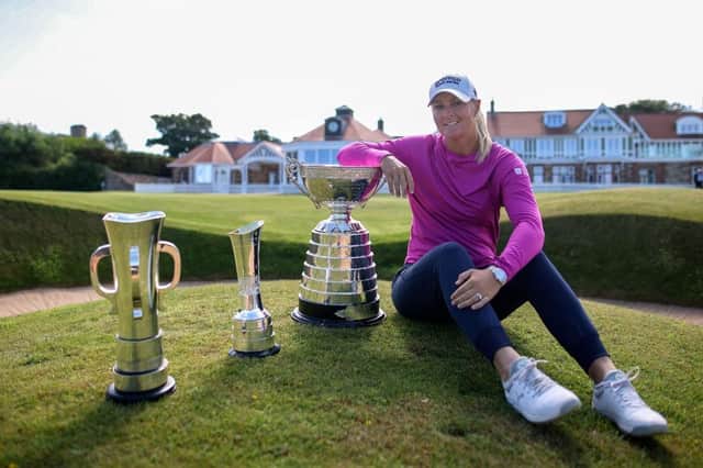 Anna Nordqvist poses outside the Muirfield clubhouse with the AIG Women’s Open trophy, the R&A Girls’ Amateur Championship trophy and Women’s Amateur Championship trophy. Picture: Charlie Crowhurst/Getty Images.