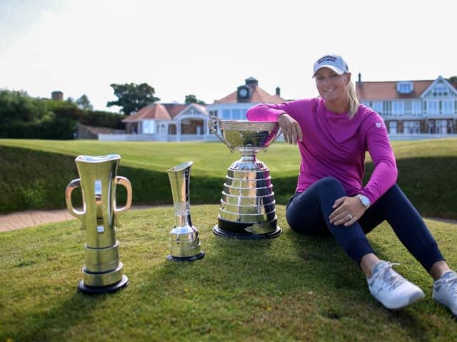 Anna Nordqvist poses outside the Muirfield clubhouse with the AIG Women’s Open trophy, the R&A Girls’ Amateur Championship trophy and Women’s Amateur Championship trophy. Picture: Charlie Crowhurst/Getty Images.