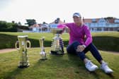 Anna Nordqvist poses outside the Muirfield clubhouse with the AIG Women’s Open trophy, the R&A Girls’ Amateur Championship trophy and Women’s Amateur Championship trophy. Picture: Charlie Crowhurst/Getty Images.