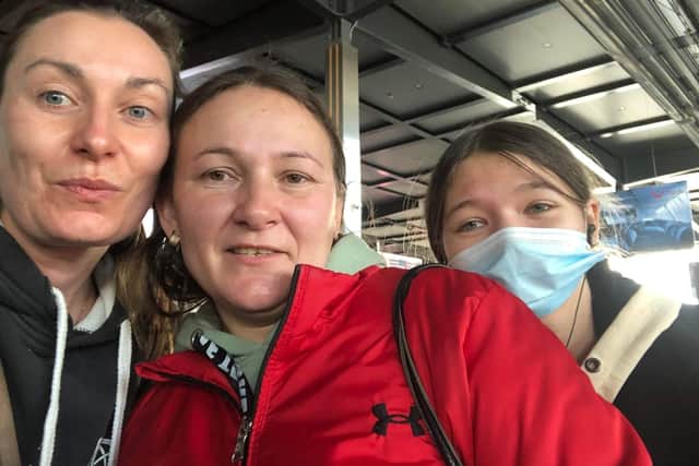 Undated handout photo of Demelza Sully (left) with some of the Ukrainian refugees she has helped rescue. The 40-year-old from the village of Eredine, in Argyll and Bute,has been driving Ukrainian refugees across Europe to help them escape the conflict. Issue date: Friday March 18, 2022.
