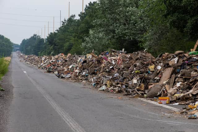 A disused stretch of road is being used to store rubble and debris from areas destroyed during floods outside Liege earlier this month (Picture: Nicolas Maeterlinck/Belga/AFP via Getty Images)