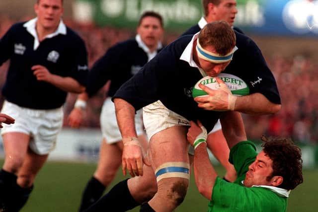 Walton is tackles by Kieron Dawson during a Five Nations Championship clash against Ireland.