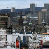 A "poor performance" in living standards has resulted in disposable income falling in Scotland's major cities