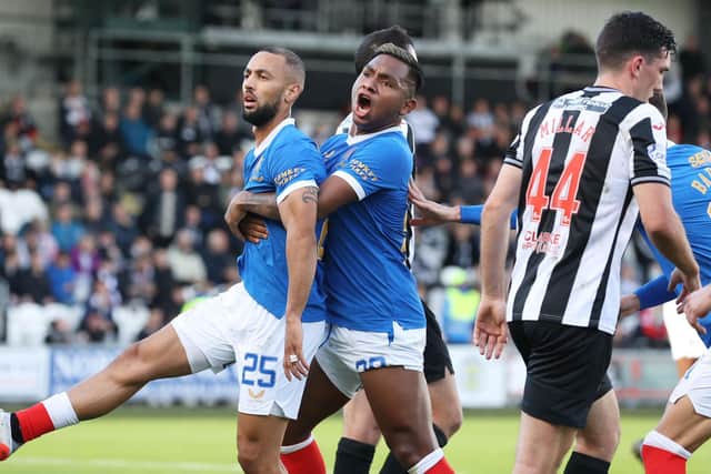 Kemar Roofe celebrates with Alfredo Morelos (right) after making it 1-1 during the cinch Premiership match between St Mirren and Rangers. (Photo by Craig Williamson / SNS Group)
