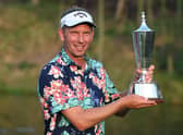 Marcel Siem poses with the trophy after winning the Hero Indian Open at DLF Golf and Country Club. Picture: Sajjad Hussaian/AFP via Getty Images.