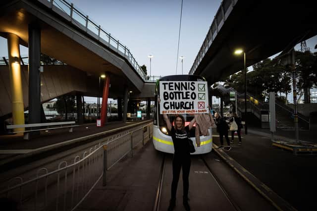 Anti-lockdown protesters demonstrate outside of Melbourne Park during the Australian Open. Picture: Darrian Traynor/Getty Images
