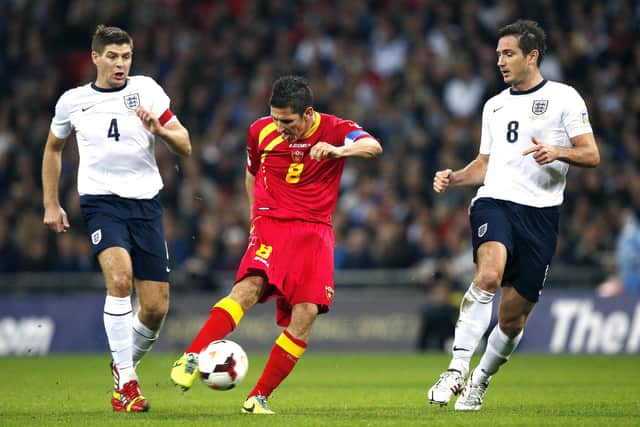 Steven Gerrard and Frank Lampard close in on Stevan Jovetic during a 2014 World Cup qualifier between England and Montenegro. (Photo by Adrian Dennis/AFP via Getty Images)