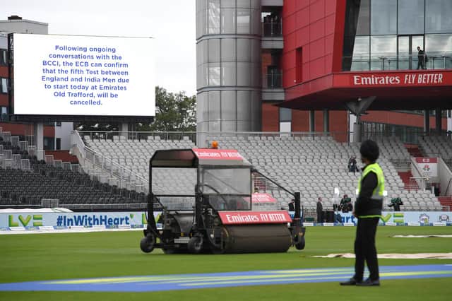 The big screen confirms the cancellation of today's Test Match between England and India at Emirates Old Trafford. (Photo by Stu Forster/Getty Images)