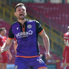 Ryan Edwards celebrates after scoring against Aberdeen in Dundee United's 3-0 victory at Pittodrie. Picture: SNS