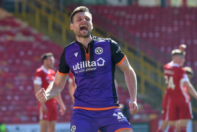 Ryan Edwards celebrates after scoring against Aberdeen in Dundee United's 3-0 victory at Pittodrie. Picture: SNS