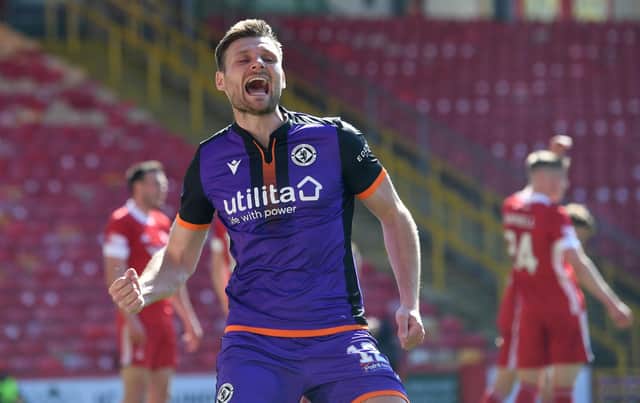 Ryan Edwards celebrates after scoring against Aberdeen in Dundee United's 3-0 victory at Pittodrie. Picture: SNS
