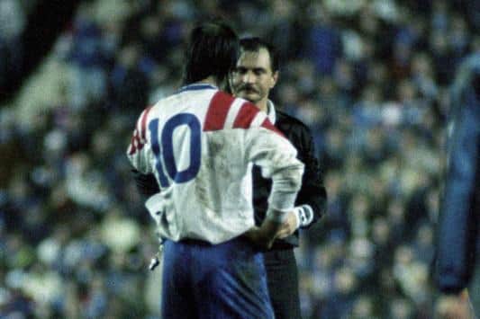 Referee Ryszard Wojoik prepares to send off Rangers striker Mark Hateley as Rangers face Club Brugge in March, 1993.
