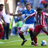 James Tavernier and Daniel Phillips in action during the 4-0 win for Rangers. (Photo by Craig Williamson / SNS Group)