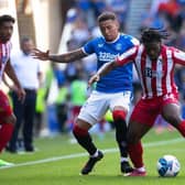 James Tavernier and Daniel Phillips in action during the 4-0 win for Rangers. (Photo by Craig Williamson / SNS Group)