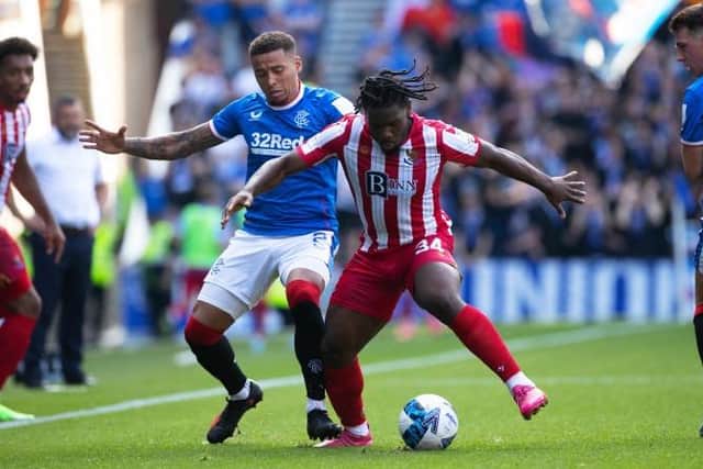 James Tavernier and Daniel Phillips in action during the 4-0 win for Rangers. (Photo by Craig Williamson / SNS Group)