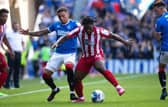 James Tavernier and Daniel Phillips in action during the 4-0 win for Rangers. (Photo by Craig Williamson / SNS Group)