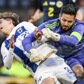 Scotland's Craig Gordon was penalised for this foul on Tomas Galvez, leading to Finland's equaliser from the penalty spot at Hampden.