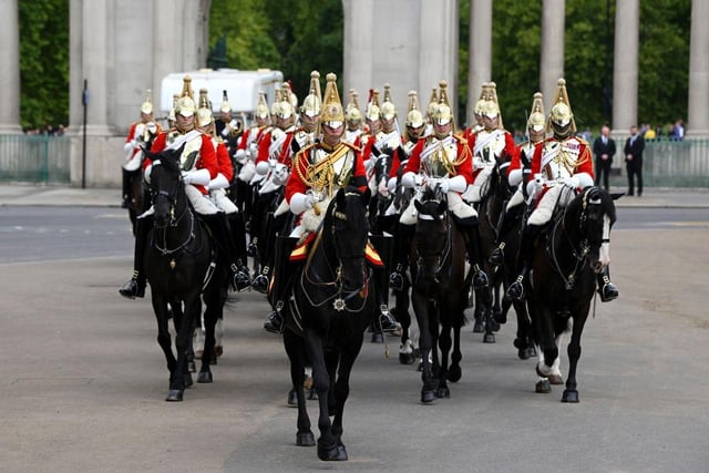 LONDON, ENGLAND - SEPTEMBER 19: Gentlemen at Arms ahead of the State Funeral of Queen Elizabeth II at Wellington Arch on September 19, 2022 in London, England. Elizabeth Alexandra Mary Windsor was born in Bruton Street, Mayfair, London on 21 April 1926. She married Prince Philip in 1947 and ascended the throne of the United Kingdom and Commonwealth on 6 February 1952 after the death of her Father, King George VI. Queen Elizabeth II died at Balmoral Castle in Scotland on September 8, 2022, and is succeeded by her eldest son, King Charles III. (Photo by David Ramos/Getty Images)