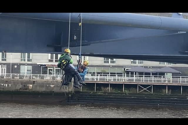 The two children from Germany abseiled down the Squinty Bridge in Glasgow at around 2.50pm on Monday afternoon.